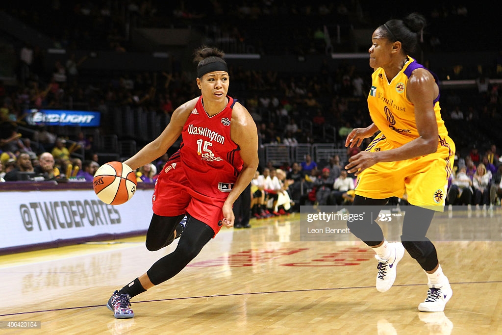 LOS ANGELES, CA - SEPTEMBER 03: Natasha Cloud #15 of the Washington Mystics handles the ball against Alana Beard of the Los Angeles Sparks in a WNBA game at Staples Center on September 3, 2015 in Los Angeles, California. (Photo by Leon Bennett/Getty Images)